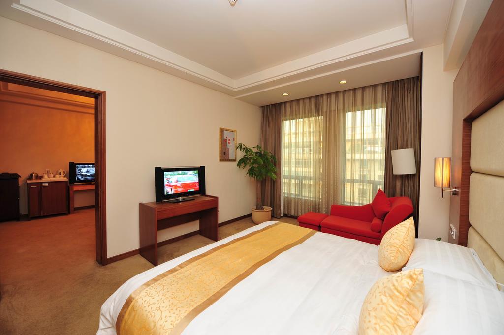 Ramada Plaza Guangzhou Hotell Rum bild