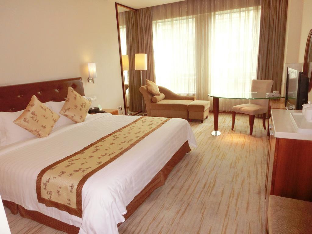 Ramada Plaza Guangzhou Hotell Rum bild